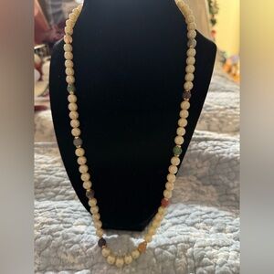 Elegant Beaded Necklace in Cream and Green